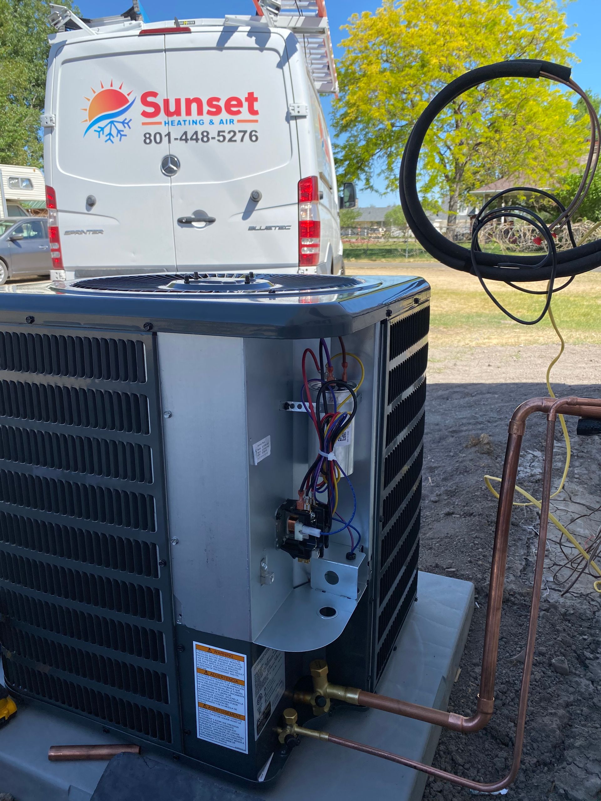 3 Utah Sunset HVAC branded vehicles